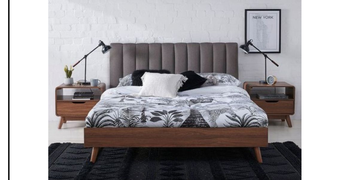 Modern solid wooden bed with upholstered headboard and matching bedside tables