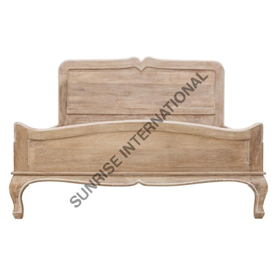 Mango wooden bed with French style headboard, curved footboard and elegant legs, front view