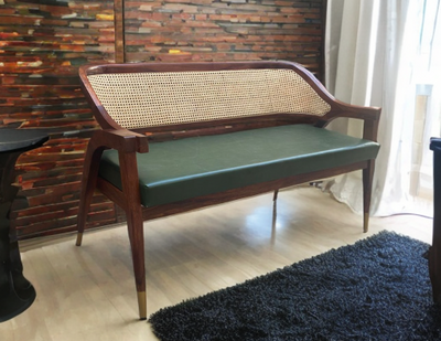 wooden bench with rattan cane design