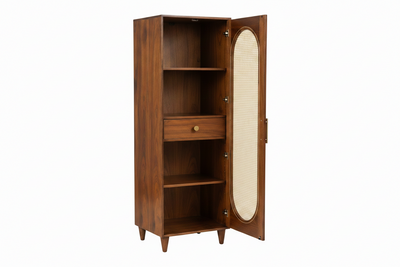 A mid-century modern wooden cabinet with a warm brown finish, featuring three open shelves, a central drawer with a brass knob, and an open door with an oval woven cane panel insert.