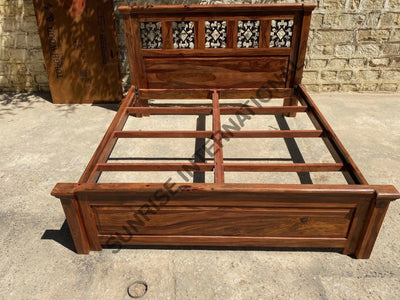 Solid wood bed frame with mattress support rails and decorative jali headboard