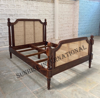 Sheesham wood rattan cane bed frame angled view showing cane headboard and footboard