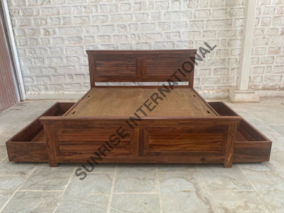 Wooden bed showing spacious storage drawers opened from both sides