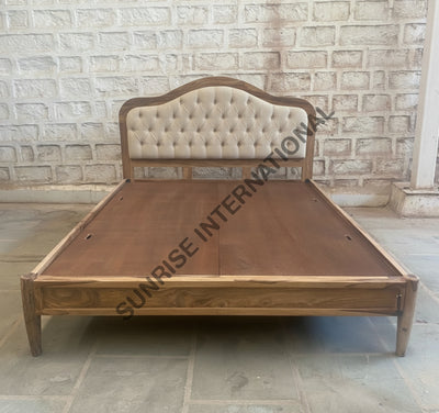 Wooden bed frame in Sheesham wood with upholstered tufted headboard, front view