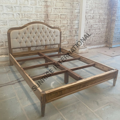 Sheesham wooden bed showing mattress support frame and tufted headboard