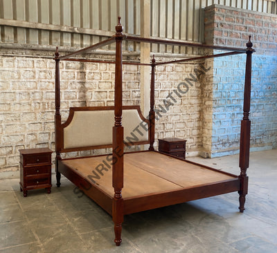 King size upholstered four poster bed with hand carved wooden posts