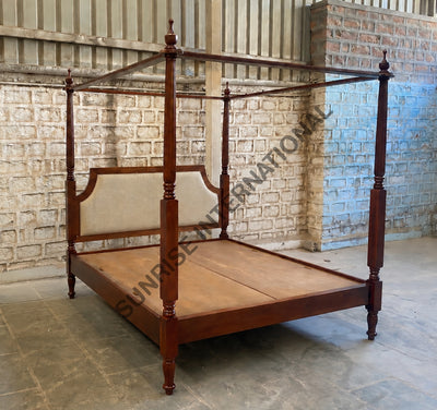 Queen size upholstered four poster wooden bed in mahogany finish