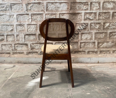 Rear view of Mango wood dining chair showing cane rattan backrest