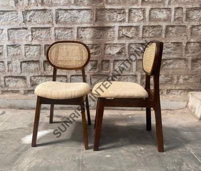 Two Mango wood rattan dining chairs showing front and side views