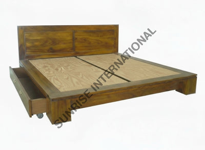 Sheesham wood bed with storage drawer open and plywood mattress base