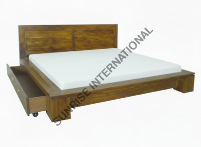 Solid wood storage bed with side drawer open and mattress shown