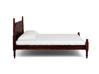 Solid Sheesham wood bed with Colonial headboard and turned posts, side view