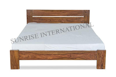Solid Sheesham wood bed with wooden headboard and mattress, front view