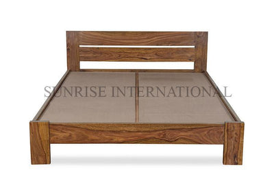 Sheesham wooden bed frame with open-panel headboard, front view