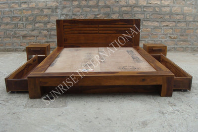 Sheesham wooden bed showing open under-bed side storage drawers