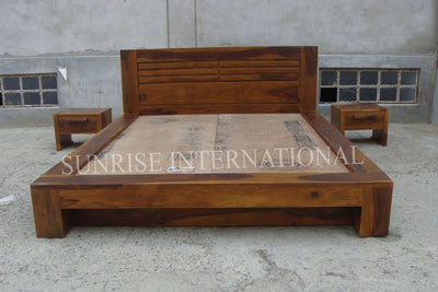 Sheesham wood storage bed with contemporary platform frame, front view