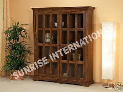 wooden bookshelf with glass door