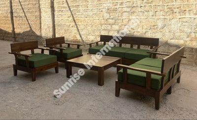 Contemporary wooden sofa set with dark wood frame and green upholstered cushions