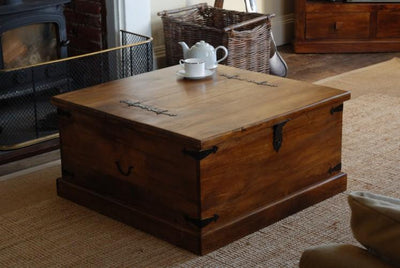 Square Mango wood coffee table with storage chest and metal hardware