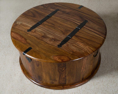 Round Sheesham wood trunk-style coffee table with hinged wooden top