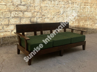Contemporary Sheesham wood three seater sofa with green upholstered cushions