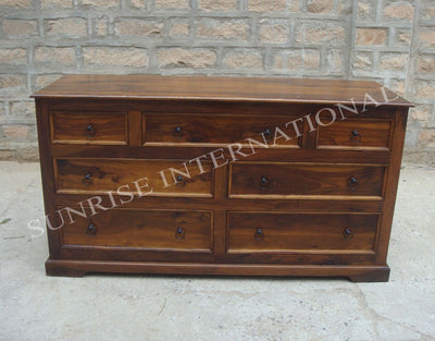 Front view of wooden 7 drawer cabinet with metal ring handles